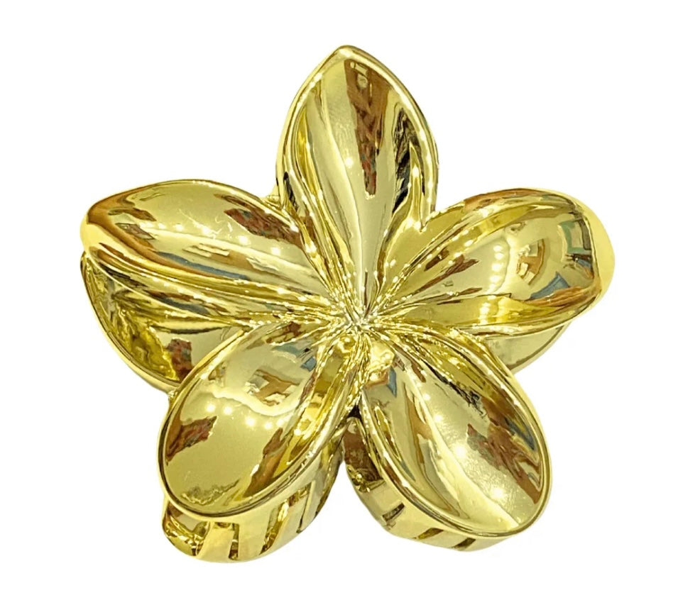 Pinza pelo flor dorada