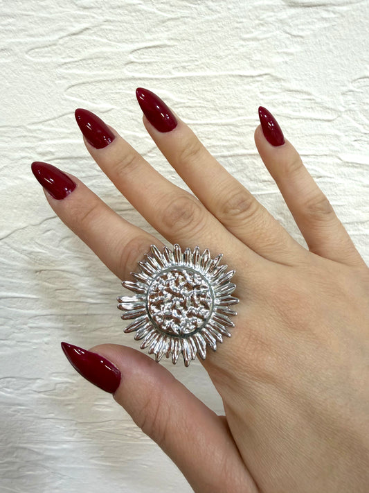 Anillo flor plateado